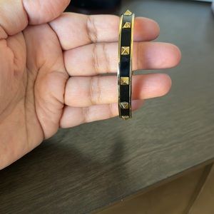 Coach gold and black metal bangle bracelet